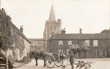 Workmen in the square at Elham